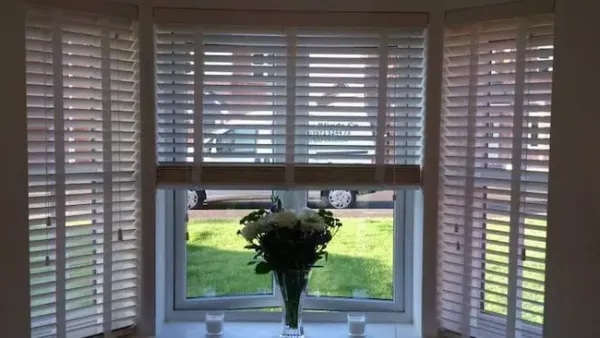 Wooden venetian blinds fitted on a bay window in an Edinburgh home