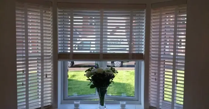 Wooden venetian blinds fitted on a bay window in an Edinburgh home
